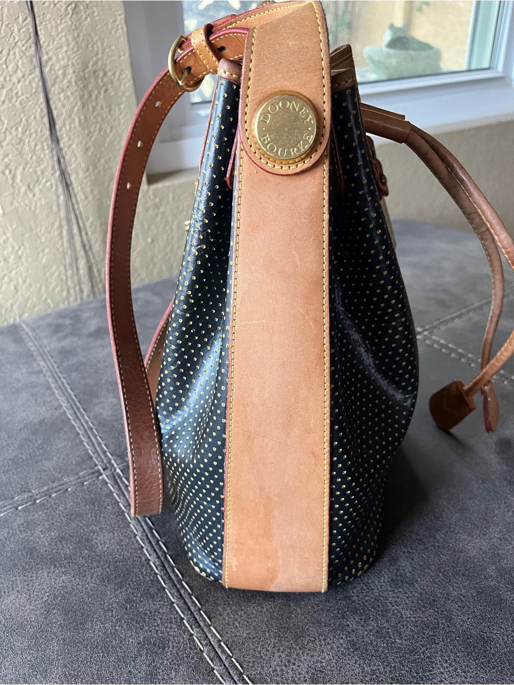 Dooney & Bourke-Vintage Black and Tan Drawstring Bucket Bag with Gold Studs - Picture 4 of 10